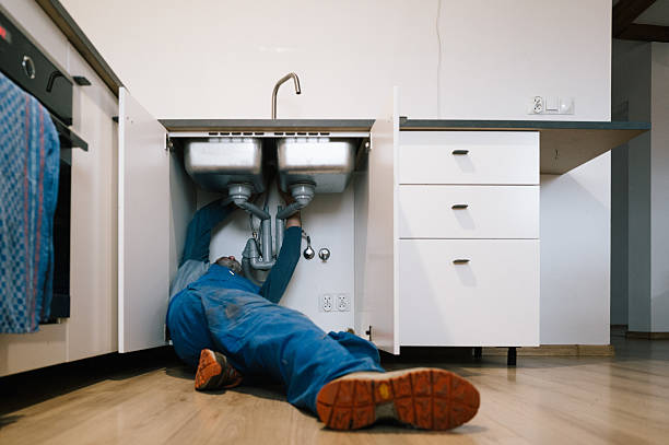 Professional Drain Cleaning technician working in Satin, TX
